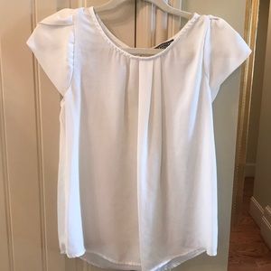 Adorable Creme top with tulip sleeves, small